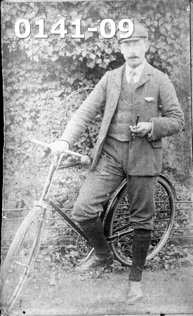 Unknown gentleman on a push bike. Date and name as yet unknown.