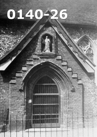 St Andrews Church C.E. Photo showing Statue of St Andrew in niche on the porch. 1938